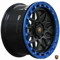 Black wheel rim with intricate star pattern, highlighted by a vibrant blue edge and a central gold logo.