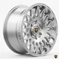 Sleek silver custom alloy wheel with intricate design and logo, perfect for enhancing vehicle aesthetics.