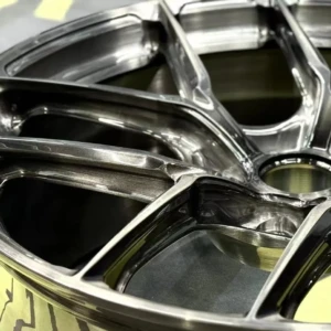 Inspected by hand, trusted by experience — Every AEGIS RIM wheel undergoes manual review to ensure it meets our uncompromising standards. AEGIS RIM technician performing manual inspection on forged wheels before final QC approval and shipment.
