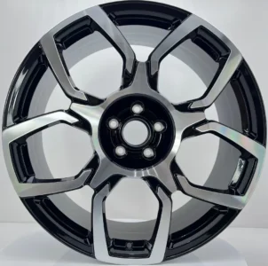 Sleek black and chrome alloy wheel featuring a modern design with five spokes and a polished finish. Perfect for any vehicle.